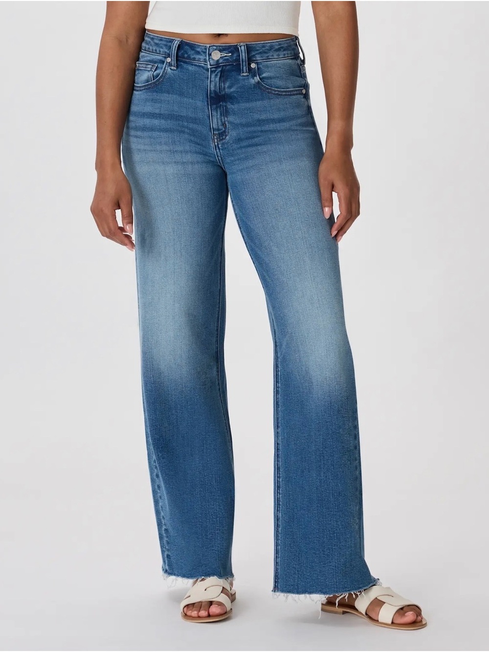 Quince Bella High-Rise Wide-Leg Frayed Jeans in Medium Blue Wash.